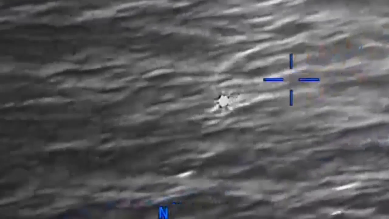 DOW-UAP-PR056, "Spherical UAP pulsing over water [CALLSIGN]"