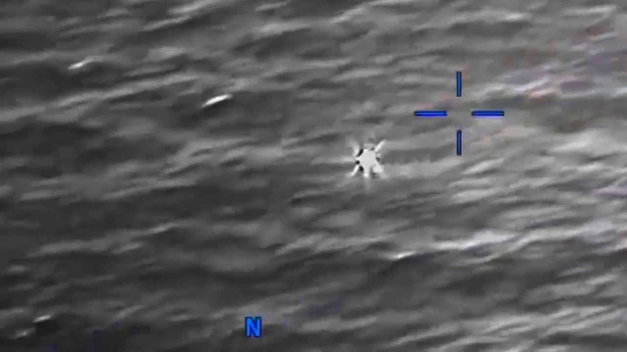 DOW-UAP-PR056, "Spherical UAP pulsing over water [CALLSIGN]"