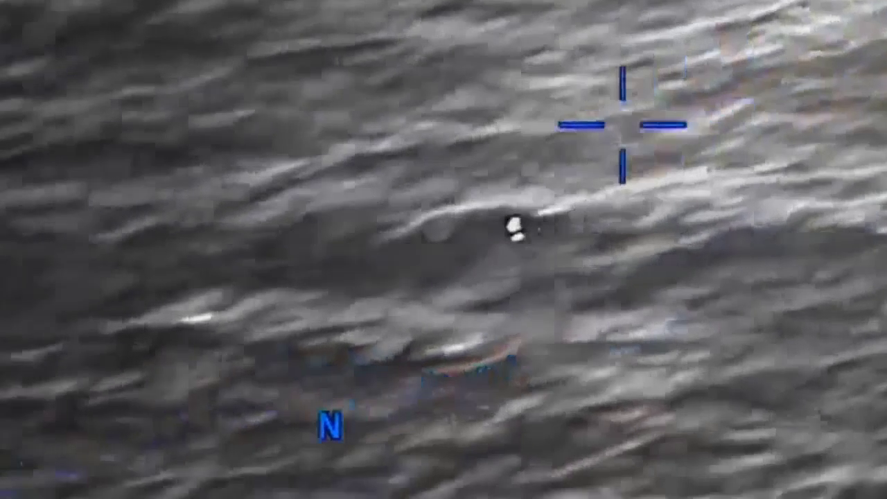 DOW-UAP-PR056, "Spherical UAP pulsing over water [CALLSIGN]"