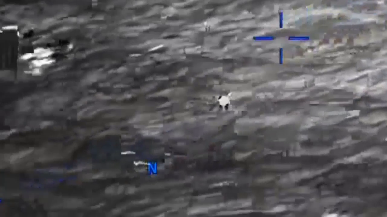 DOW-UAP-PR056, "Spherical UAP pulsing over water [CALLSIGN]"
