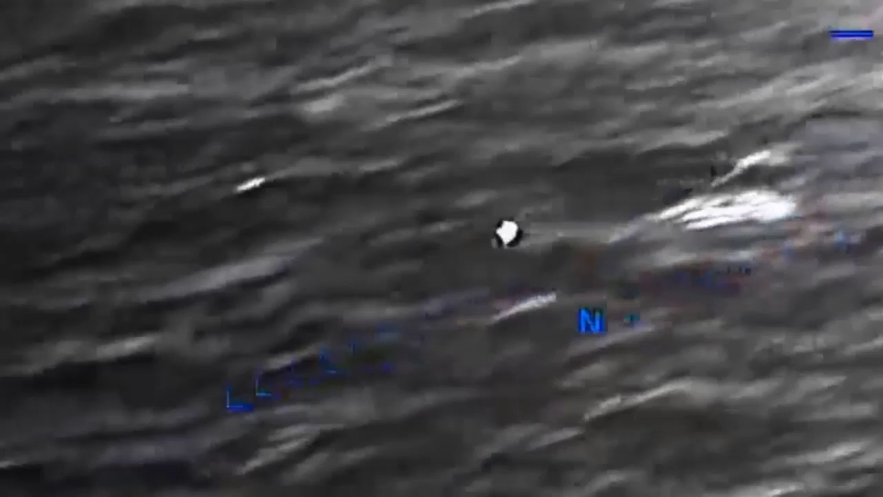 DOW-UAP-PR056, "Spherical UAP pulsing over water [CALLSIGN]"