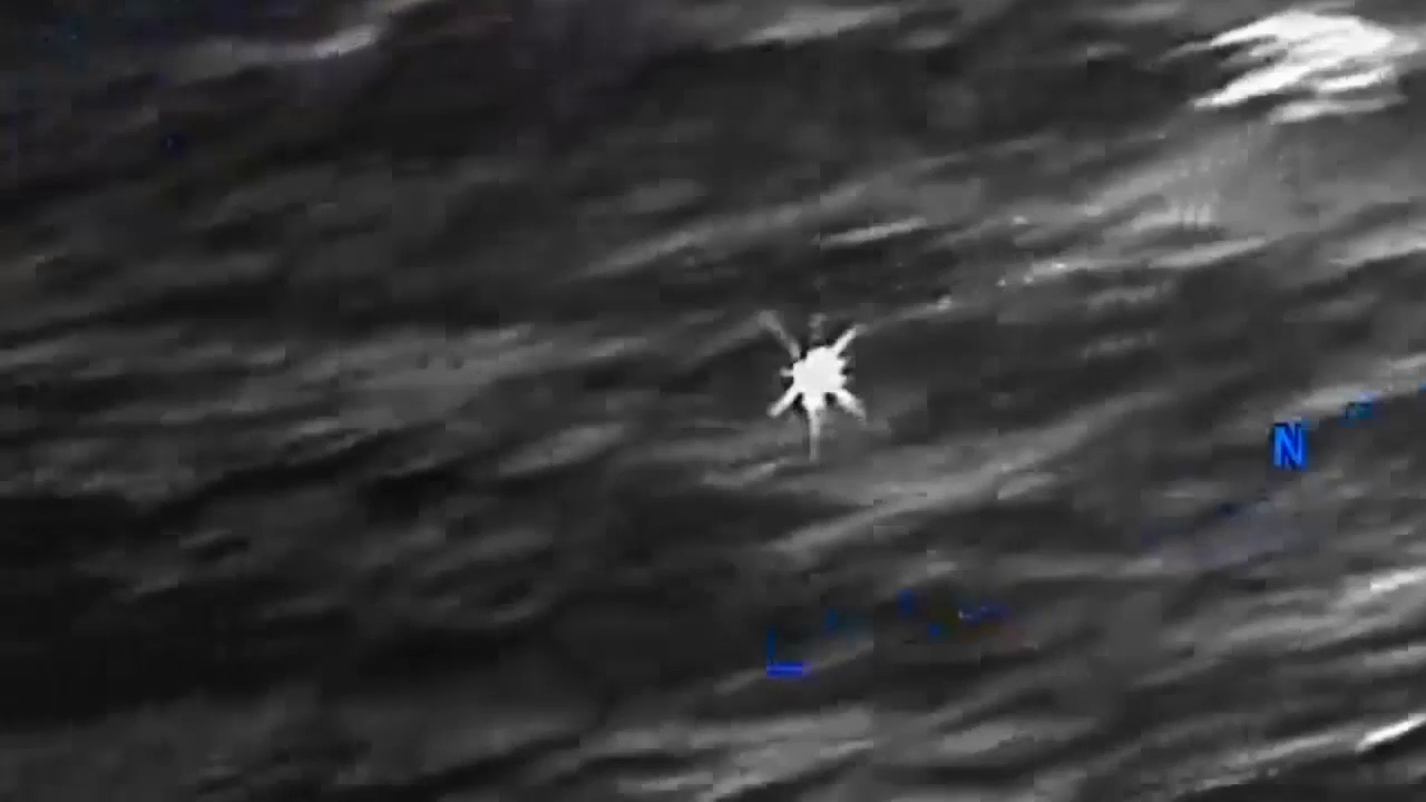 DOW-UAP-PR056, "Spherical UAP pulsing over water [CALLSIGN]"