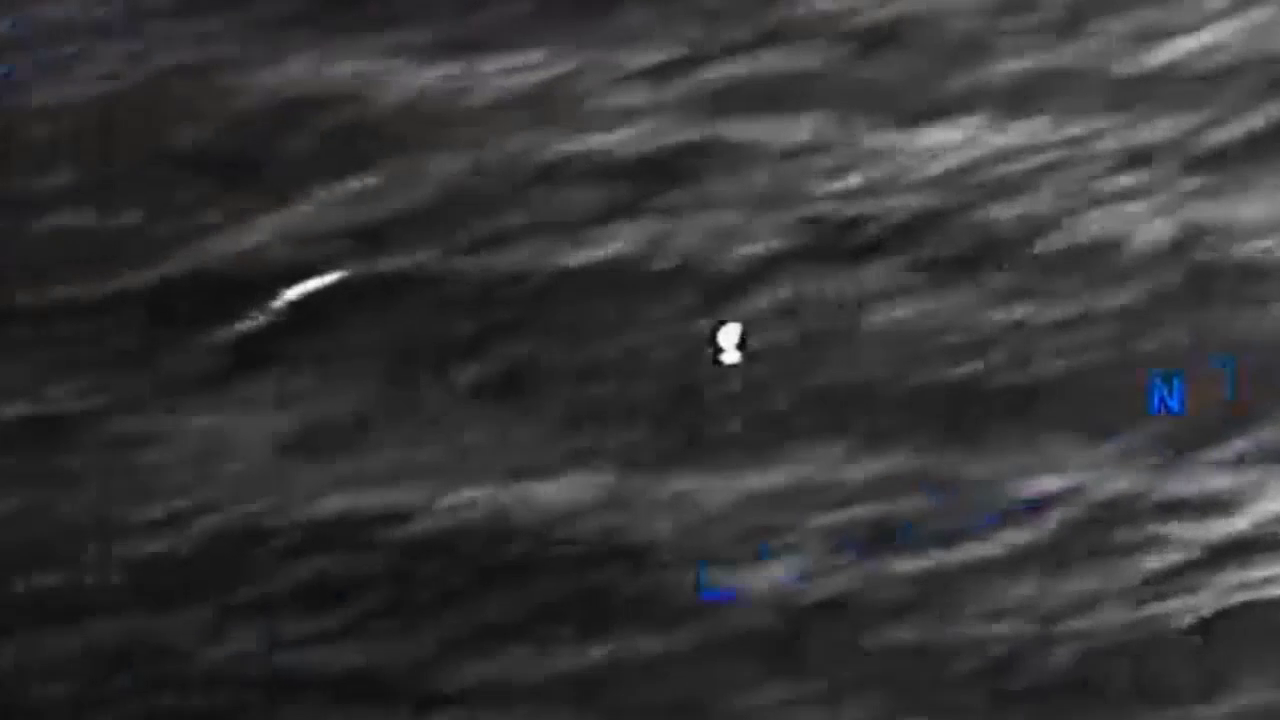 DOW-UAP-PR056, "Spherical UAP pulsing over water [CALLSIGN]"
