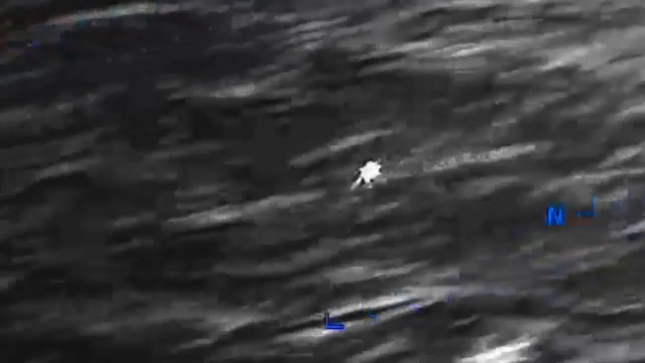 DOW-UAP-PR056, "Spherical UAP pulsing over water [CALLSIGN]"