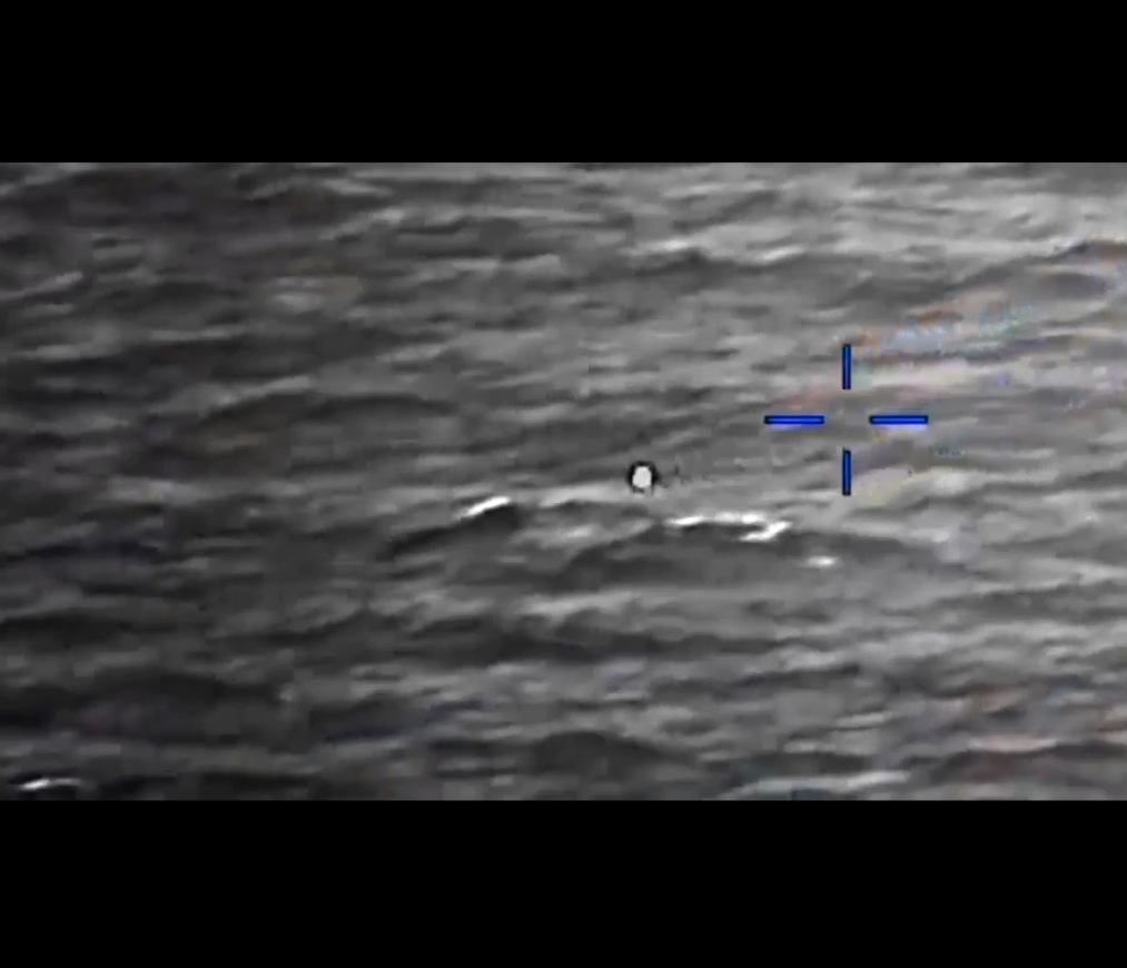 DOW-UAP-PR056, "Spherical UAP pulsing over water [CALLSIGN]"