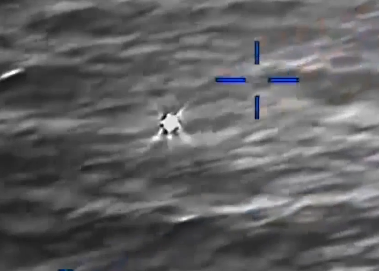 DOW-UAP-PR056, "Spherical UAP pulsing over water [CALLSIGN]"
